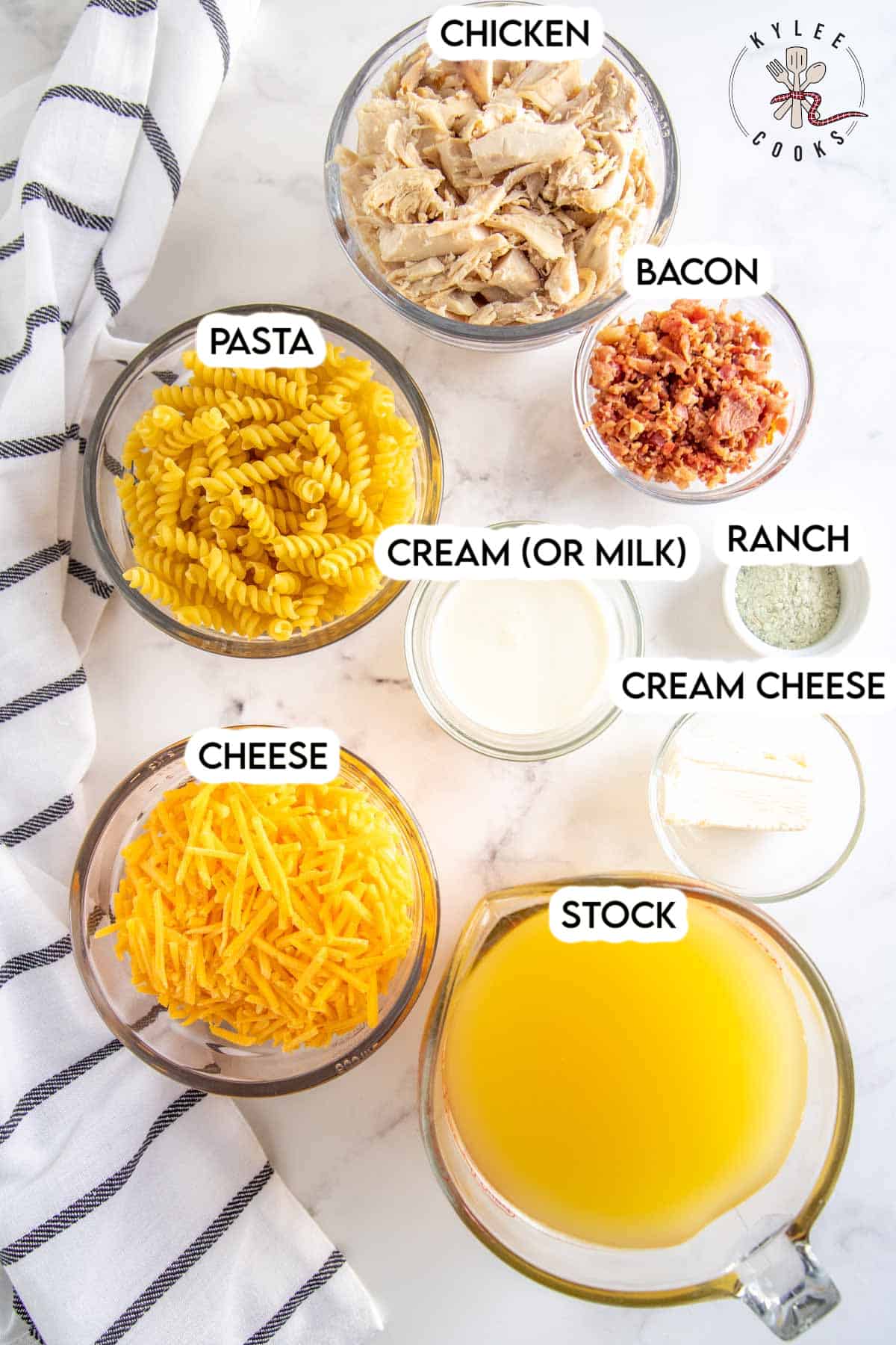 Ingredients to make Chicken Bacon Ranch Pasta laid out and labeled.