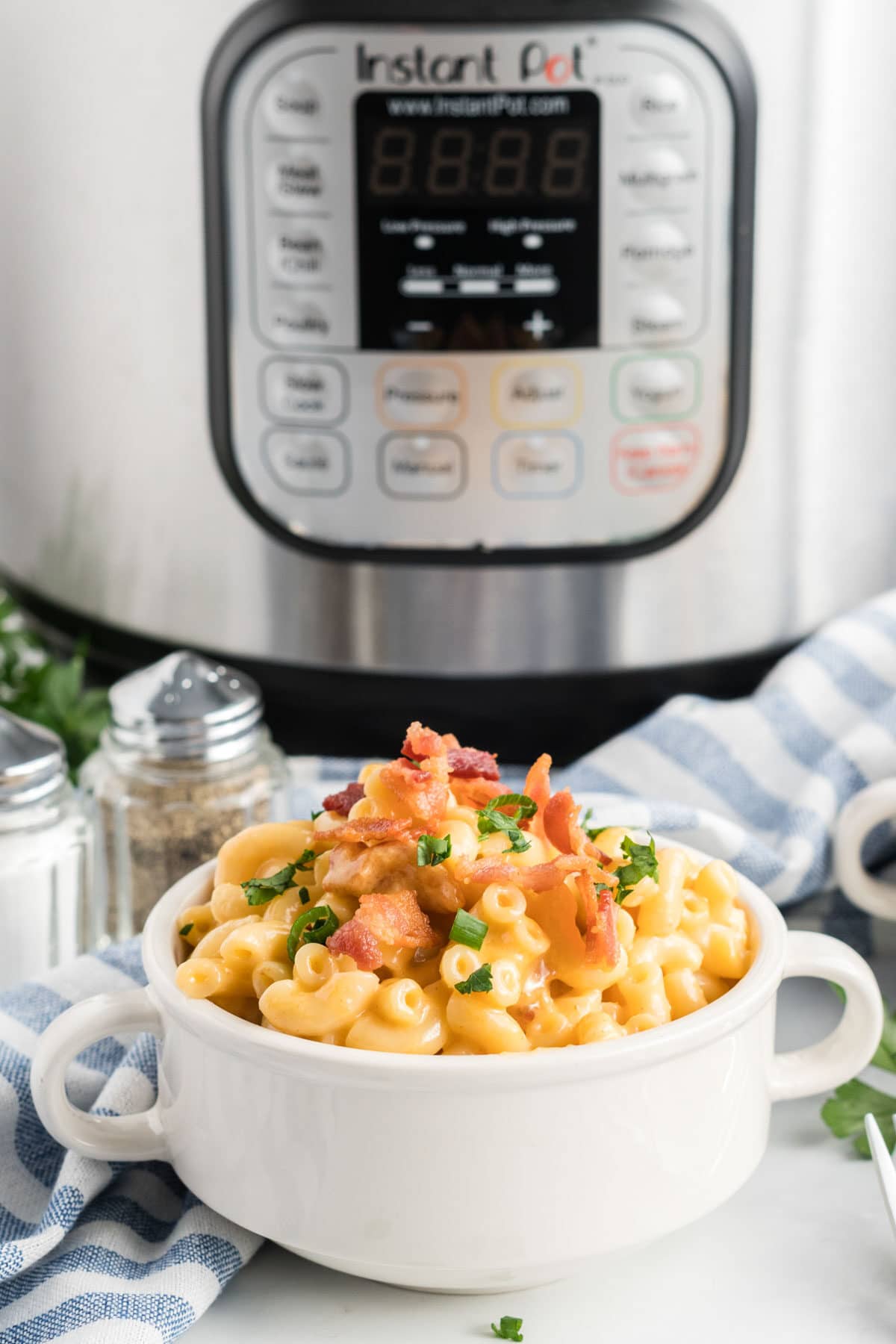 Instant pot mac and cheese in a white bowl