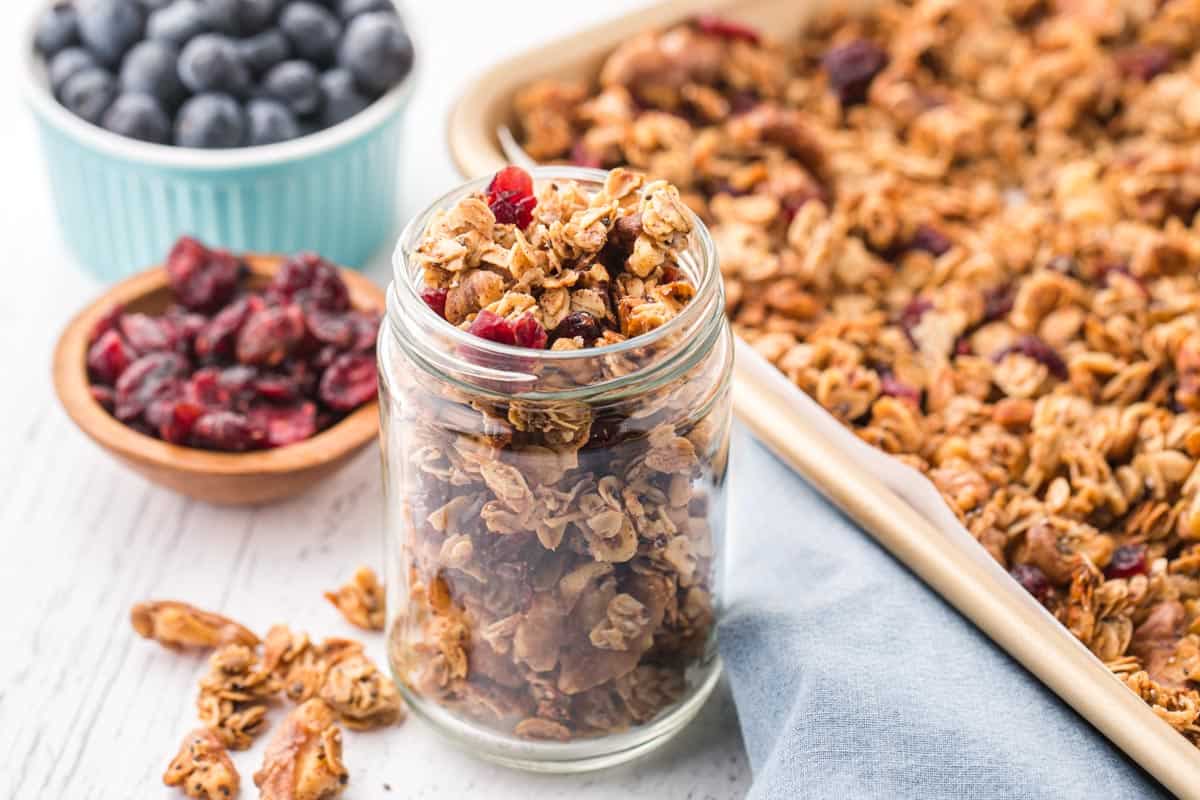 homemade granola in a jar with berries