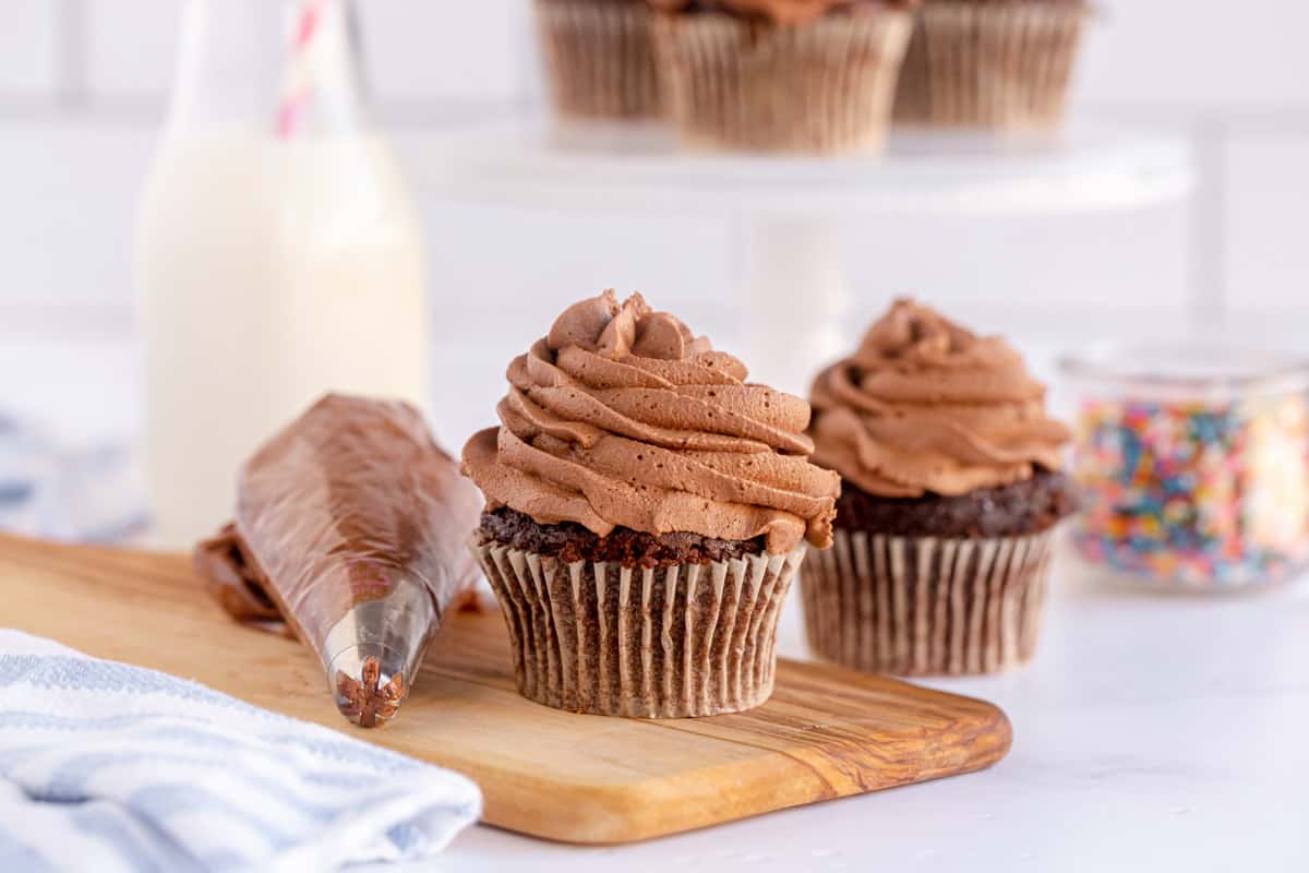 chocolate frosting in a piping bag