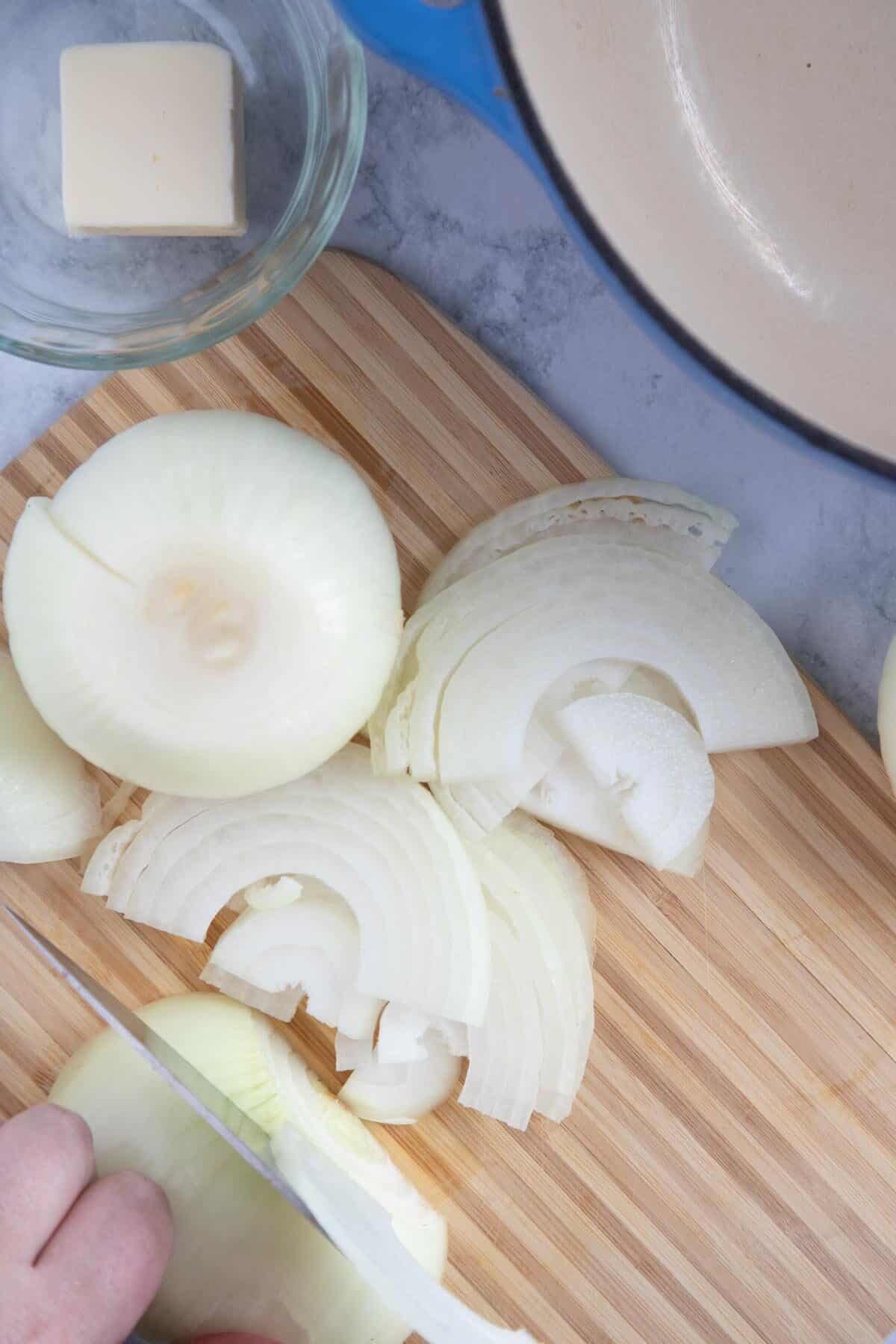 cutting onions into thin slices
