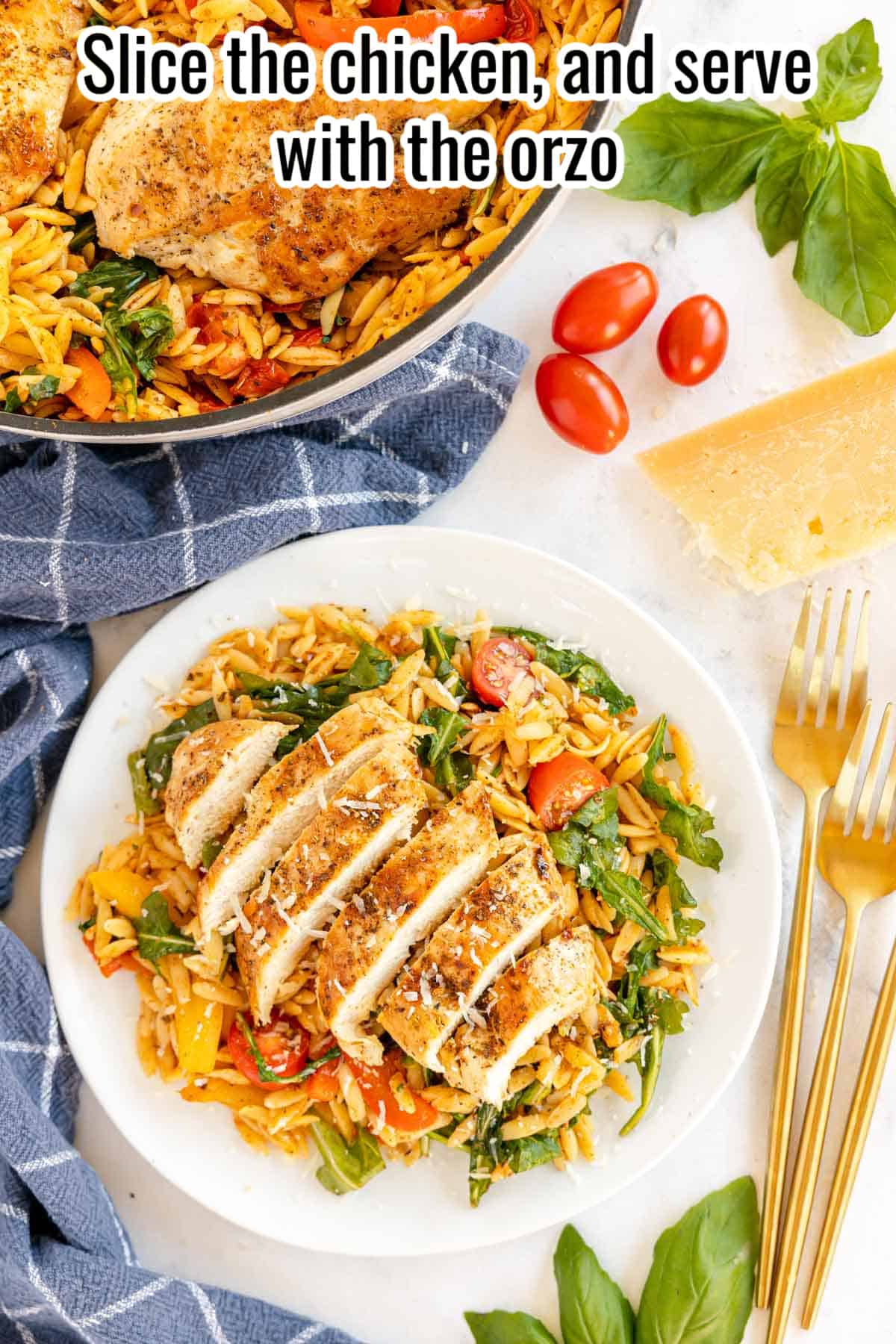 sliced chicken on top of orzo with arugula.