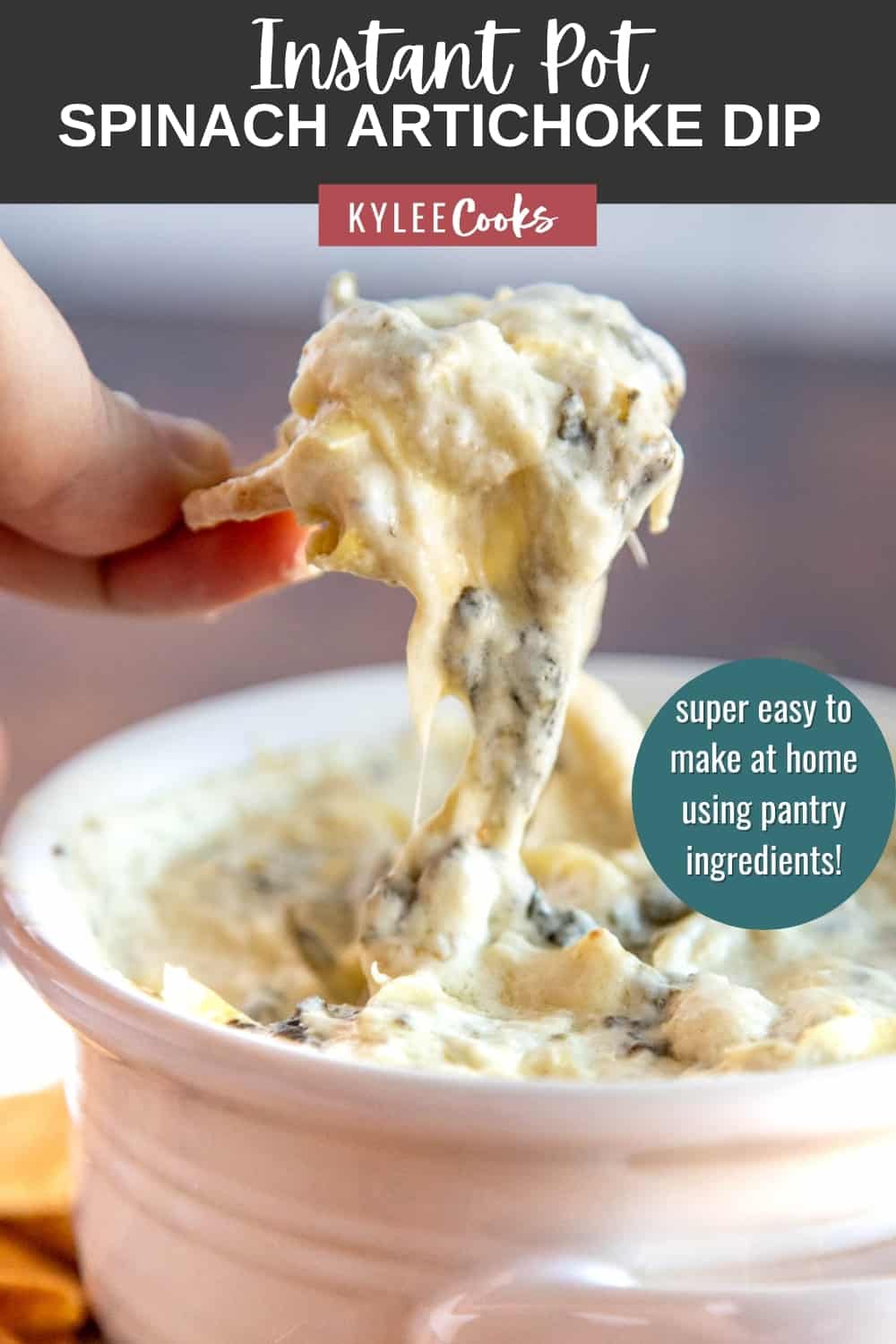 spinach artichoke dip being pulled from a bowl with garlic bread with text overlay