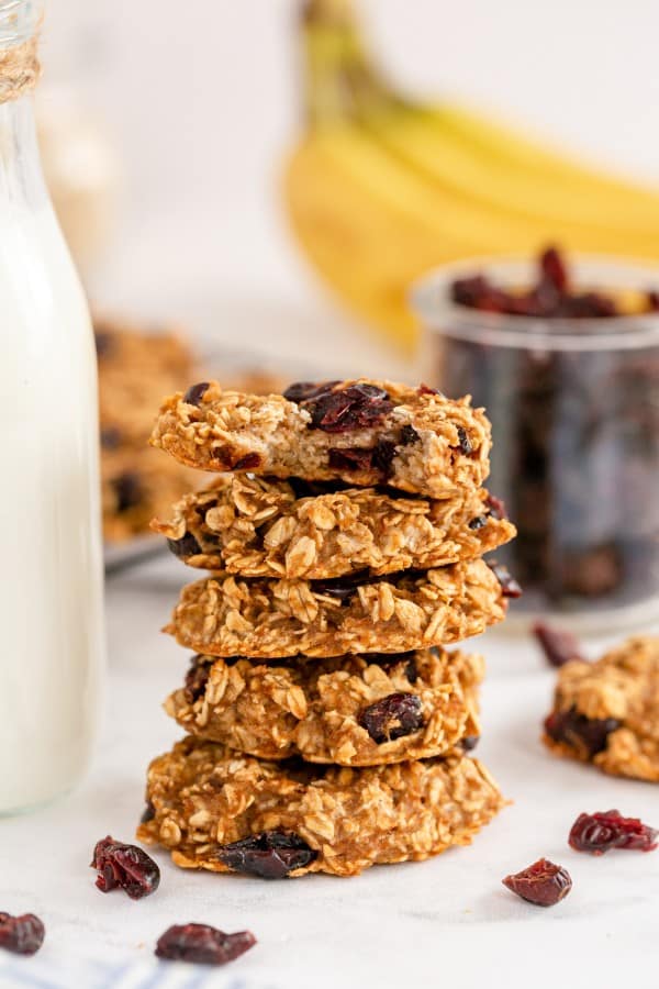 oatmeal breakfast cookies in a stack with a bottle of milk