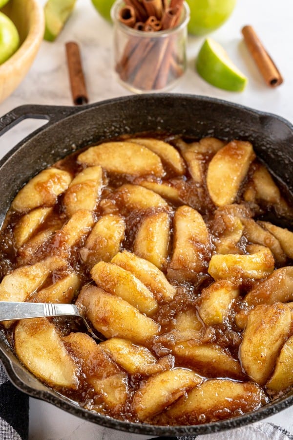 fried apples in a cast iron skillet