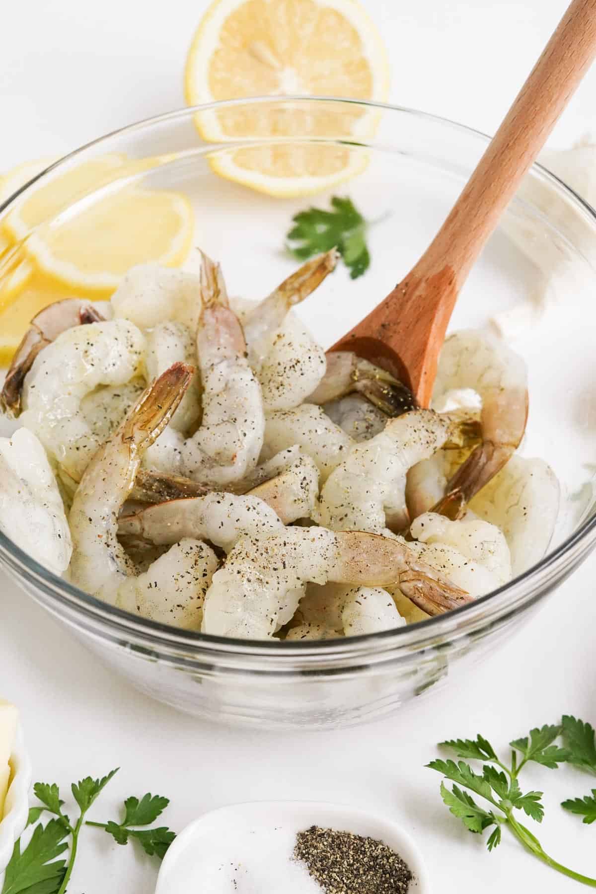 shrimp in a bowl with lemons