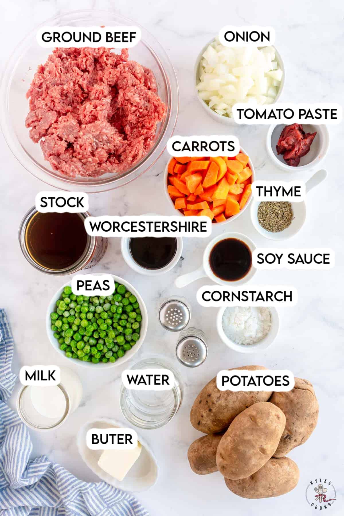 ingredients to make shepherd's pie laid out and labeled