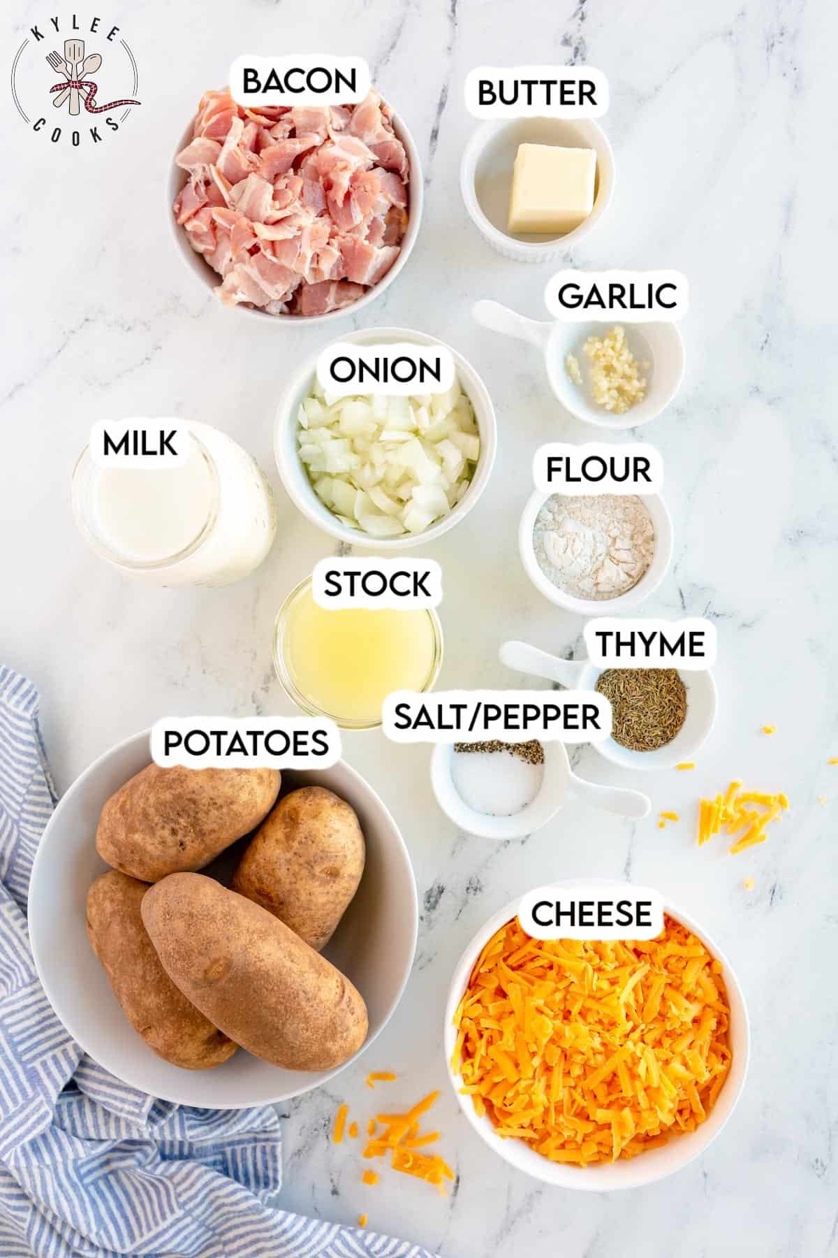 ingredients to make loaded scalloped potatoes laid out and labeled