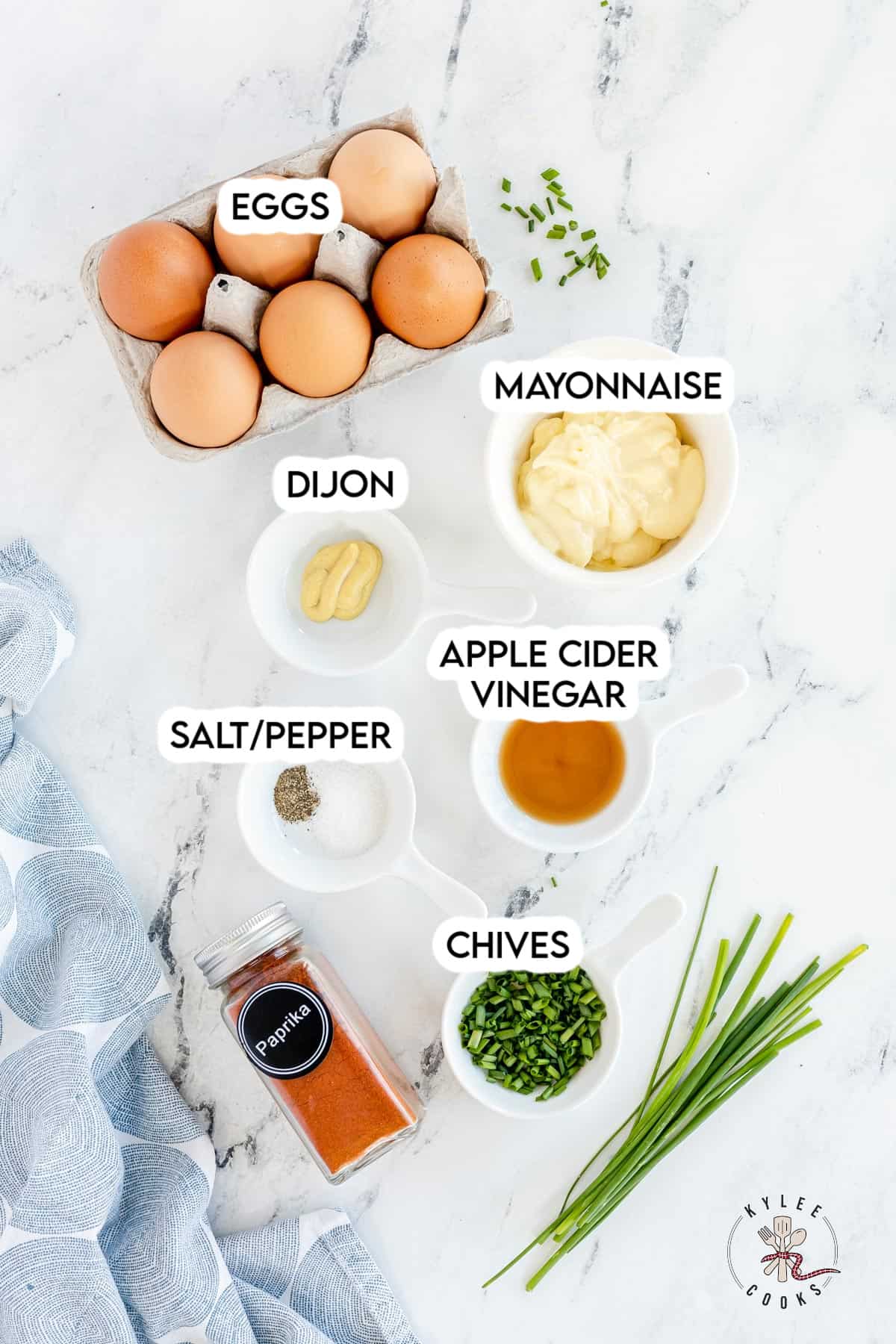 ingredients to make deviled eggs laid out and labeled