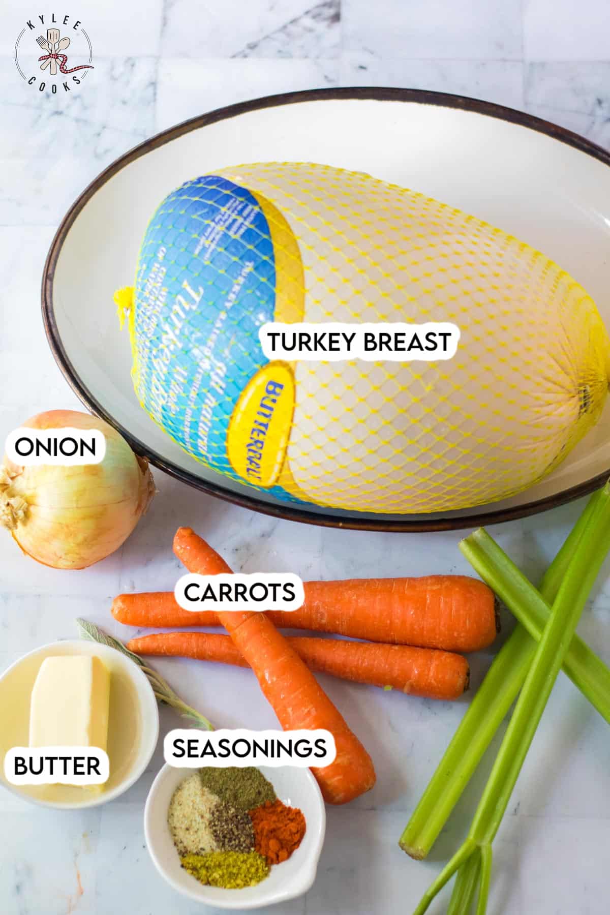 ingredients to make a crockpot turkey breast laid out and labeled.