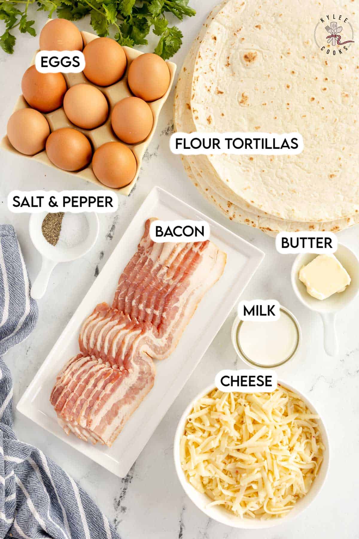 ingredients to make breakfast quesadillas laid out and labeled.