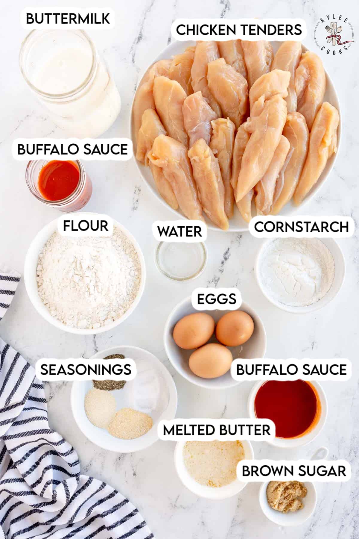 ingredients to make buffalo chicken tenders laid out and labeled.