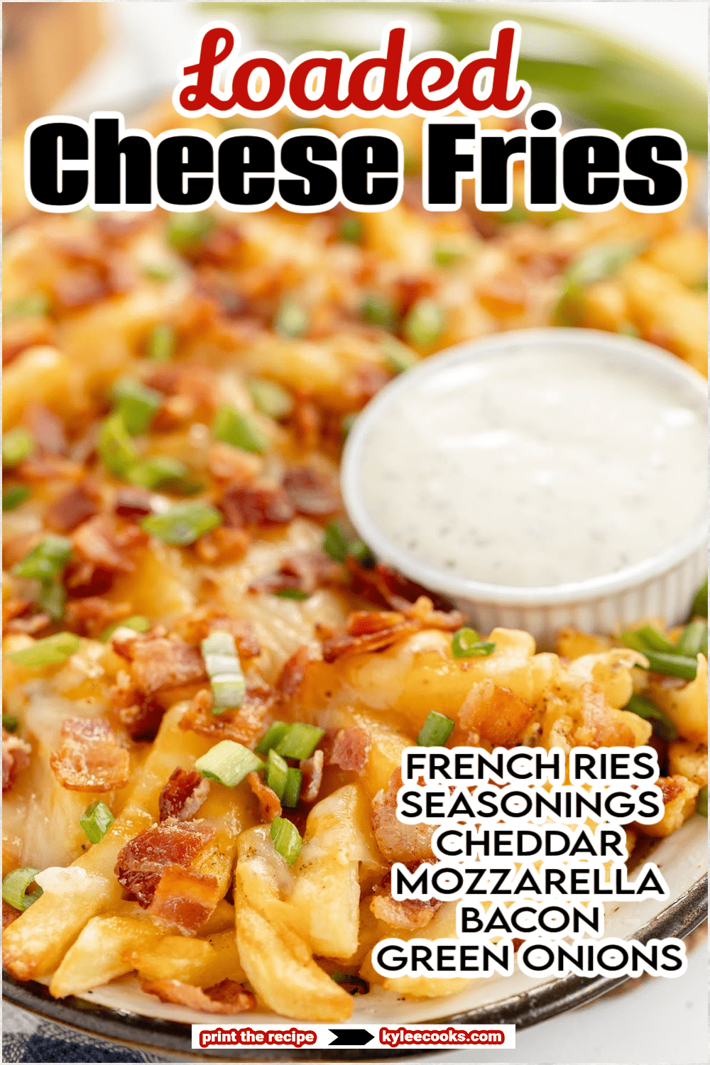 loaded cheese fries on a platter with recipe name overlaid in text.