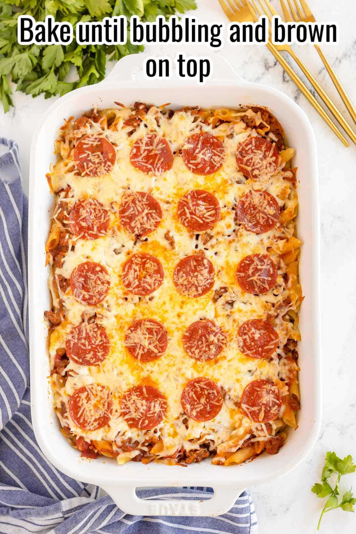 baked pizza casserole with instructions overlaid in text.
