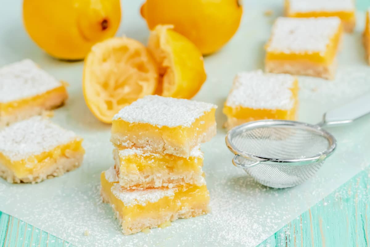 3 lemon bars stacked on top of each other.