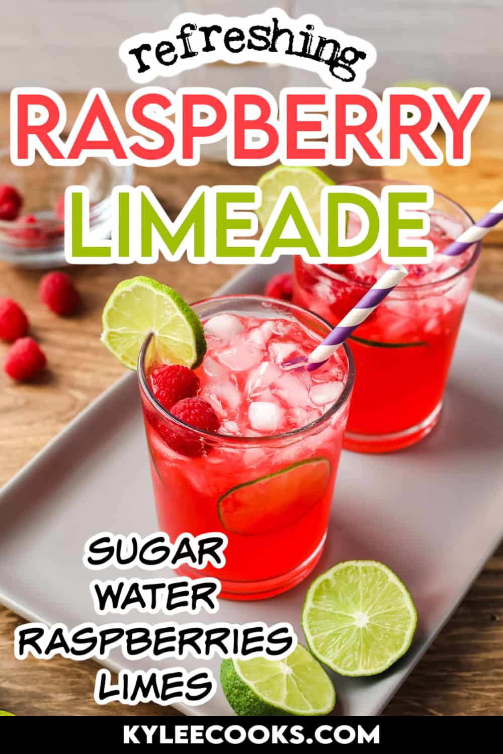 raspberry limeade in two glasses on a tray with limes with recipe name and ingredients overlaid in text.
