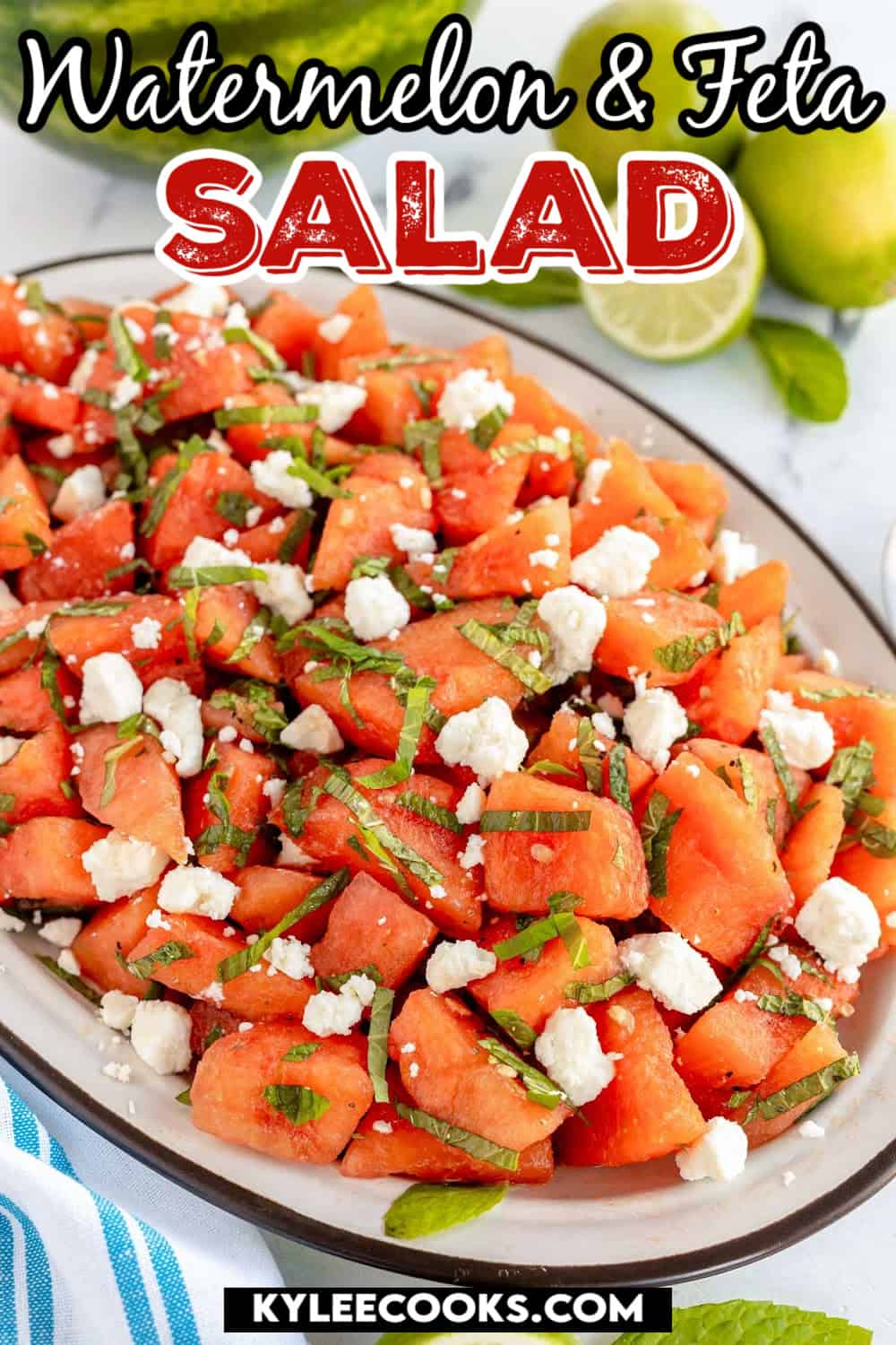 watermelon salad on an oval plate with recipe name overlaid in text.