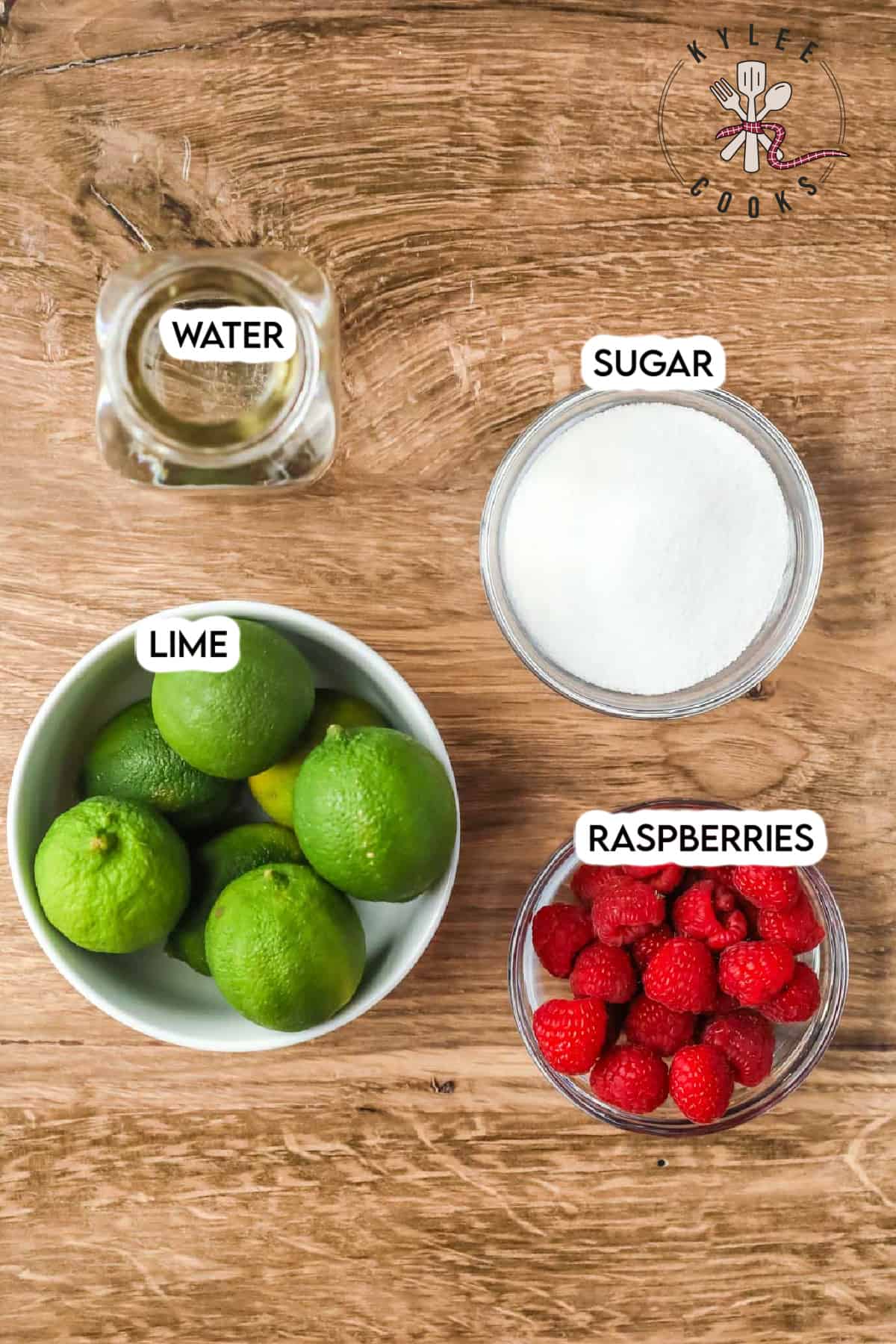 ingredients to make raspberry limeade laid out and labeled.
