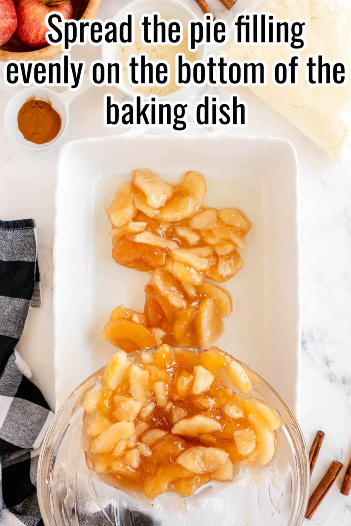 Spread the pie filling evenly on the bottom of the baking dish for an Apple Dump Cake.
