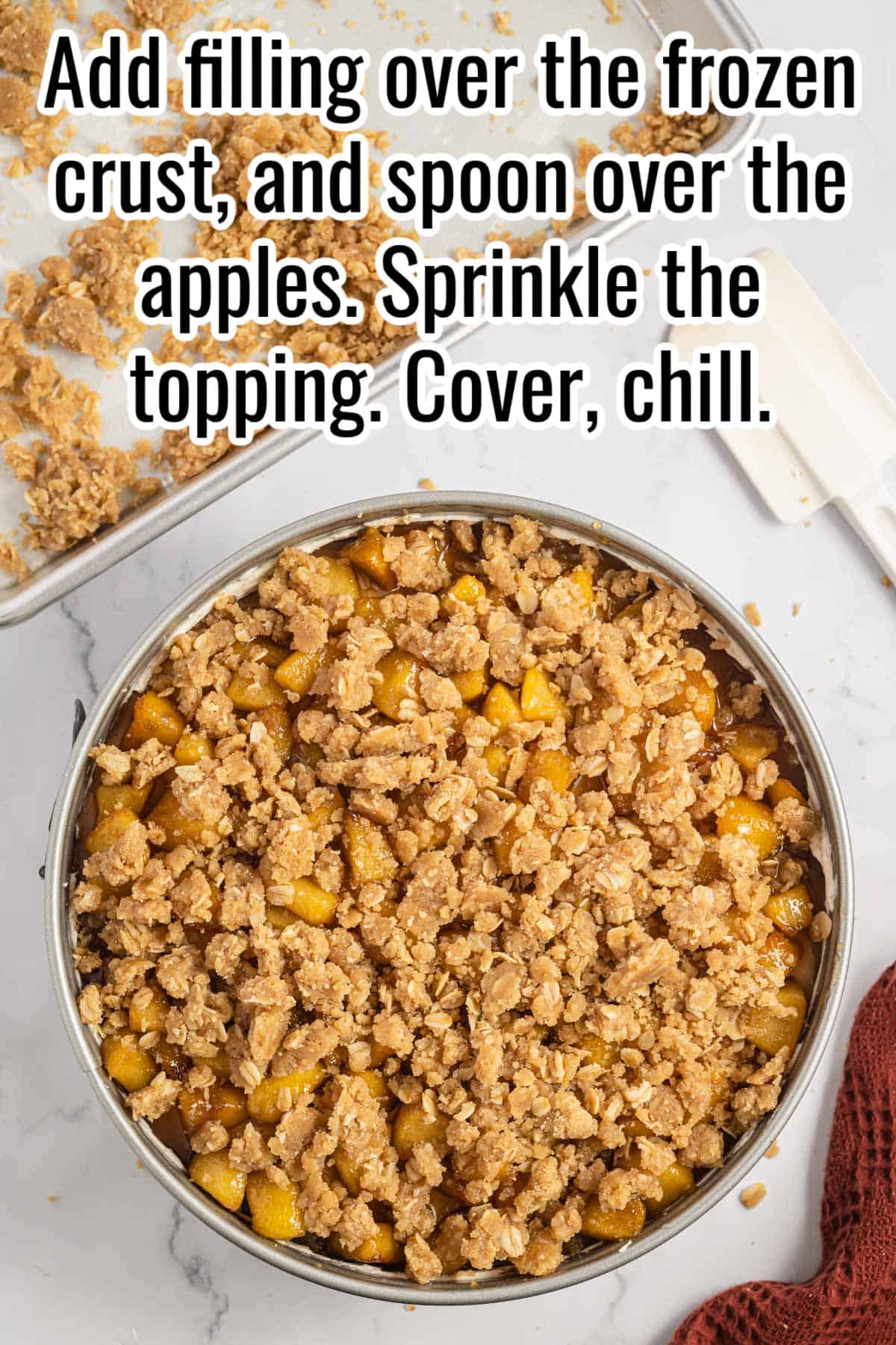 apple crisp cheesecake with instructions for topping overlaid in text.