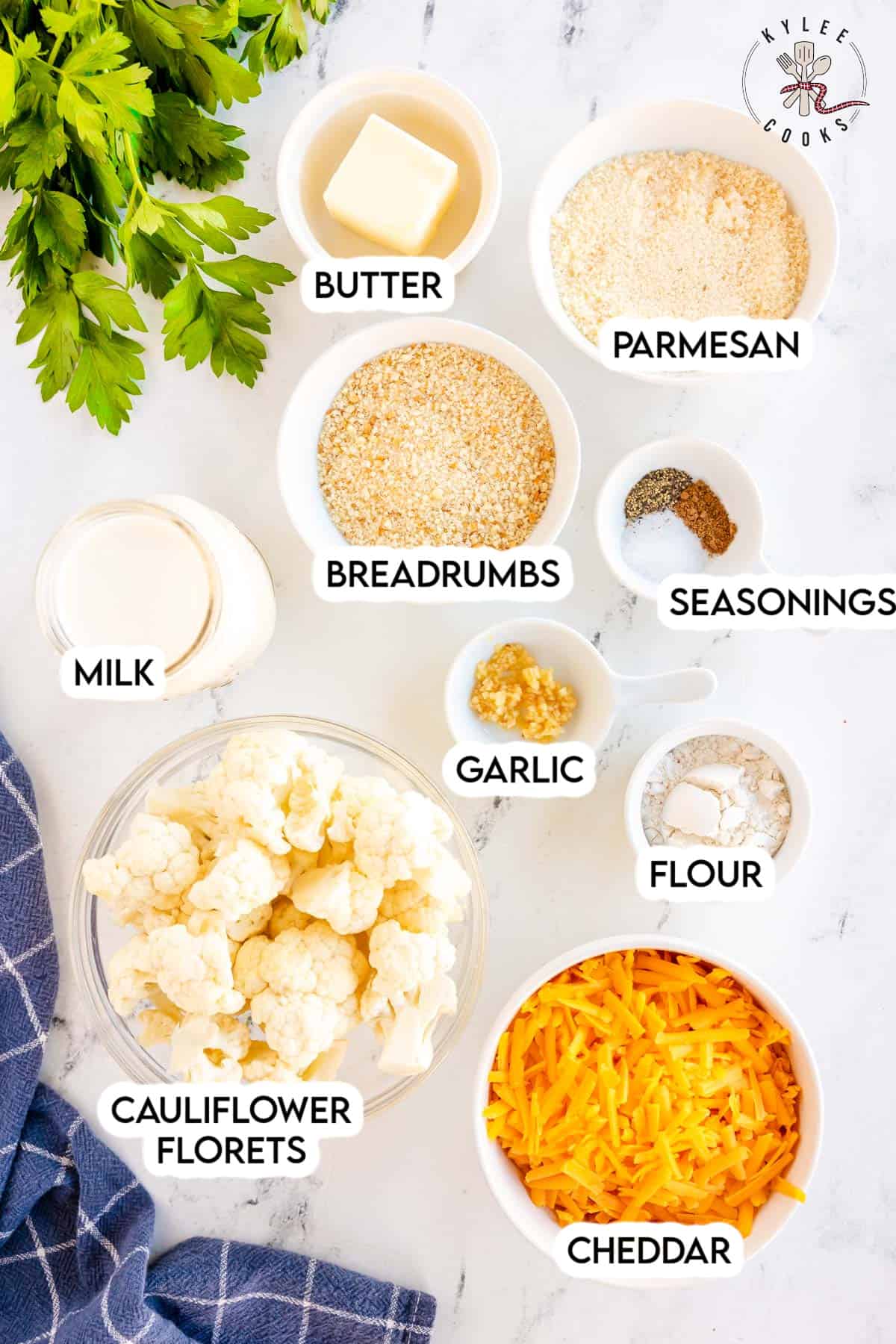ingredients to make cauliflower au gratin laid out and labeled.