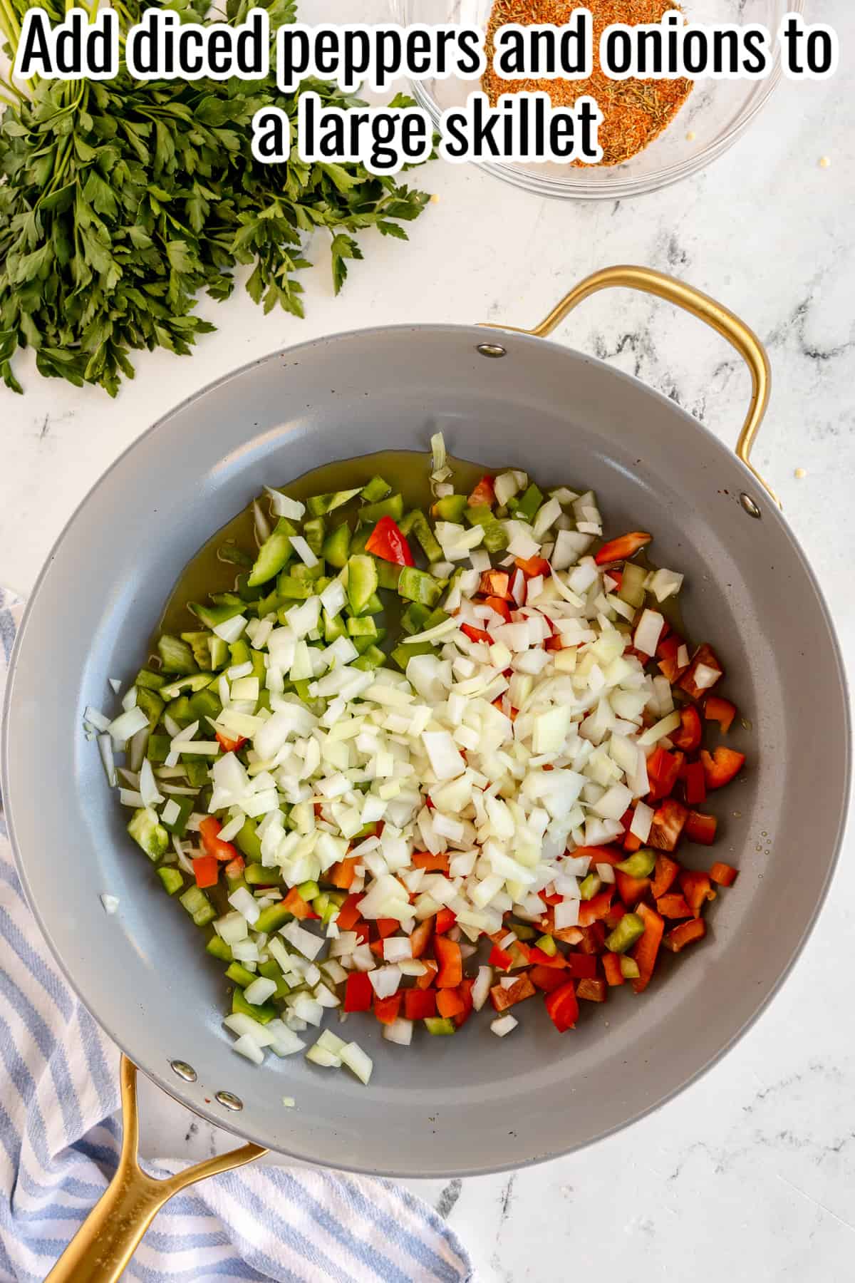 diced peppers and onions in a skillet.