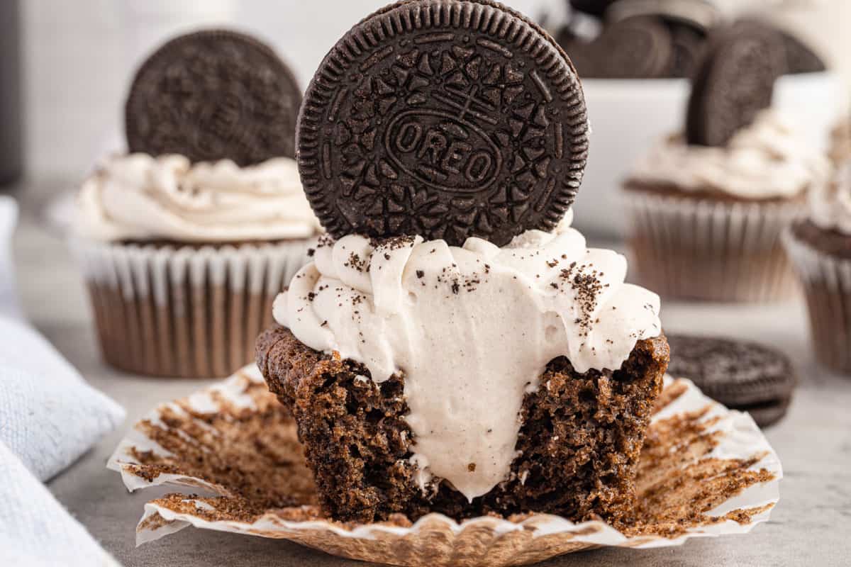 oreo cupcake cut in half to show the filling.