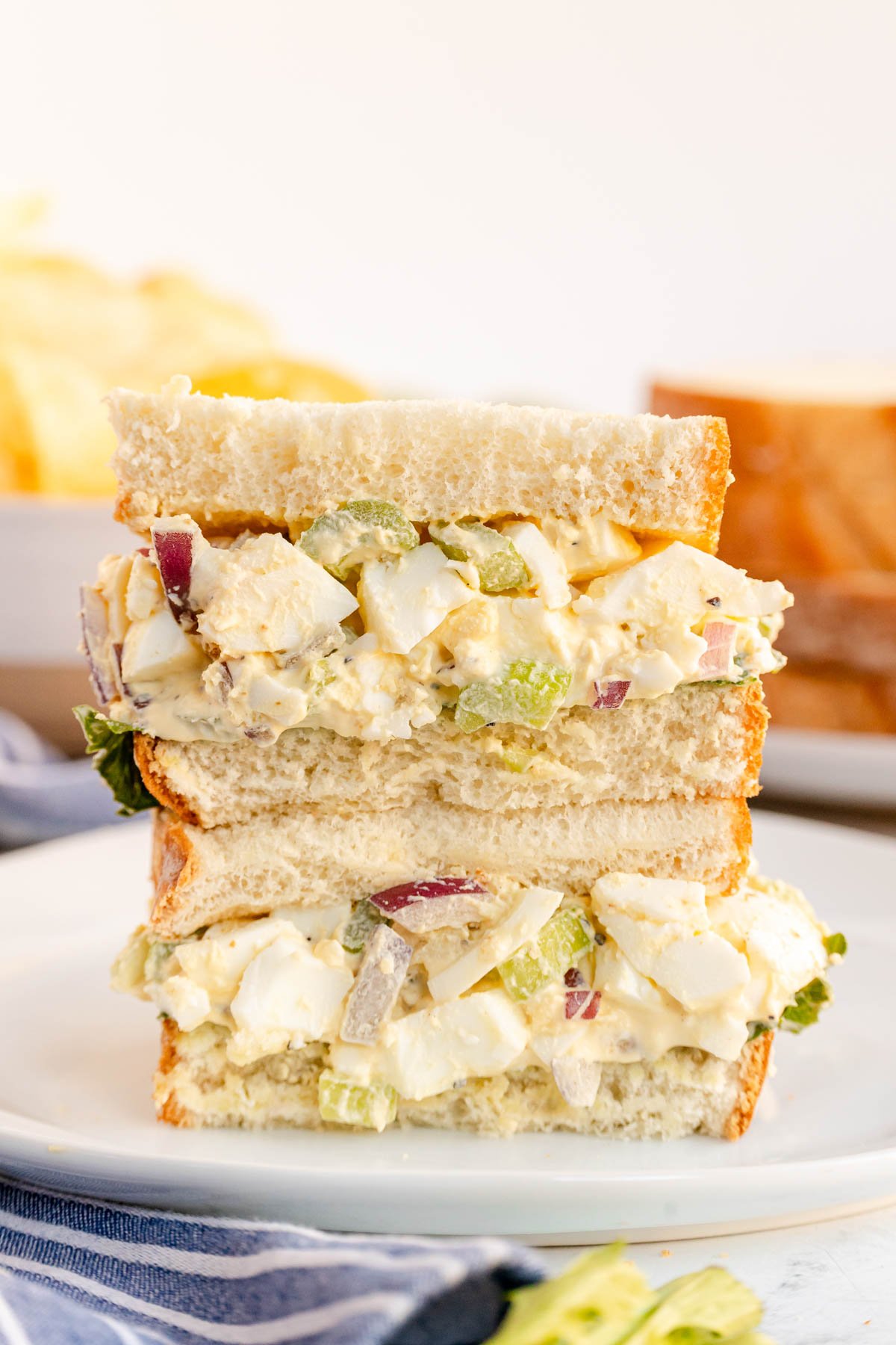 egg salad sandwiches stacked.