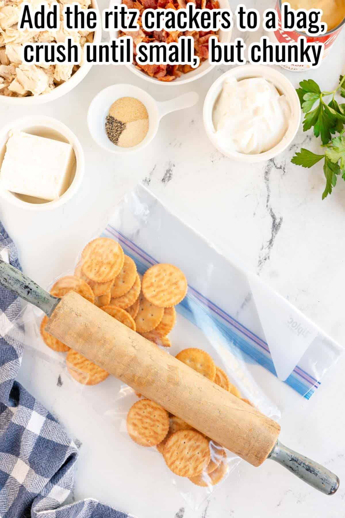 ritz crackers in a bag with a rolling pin over top.