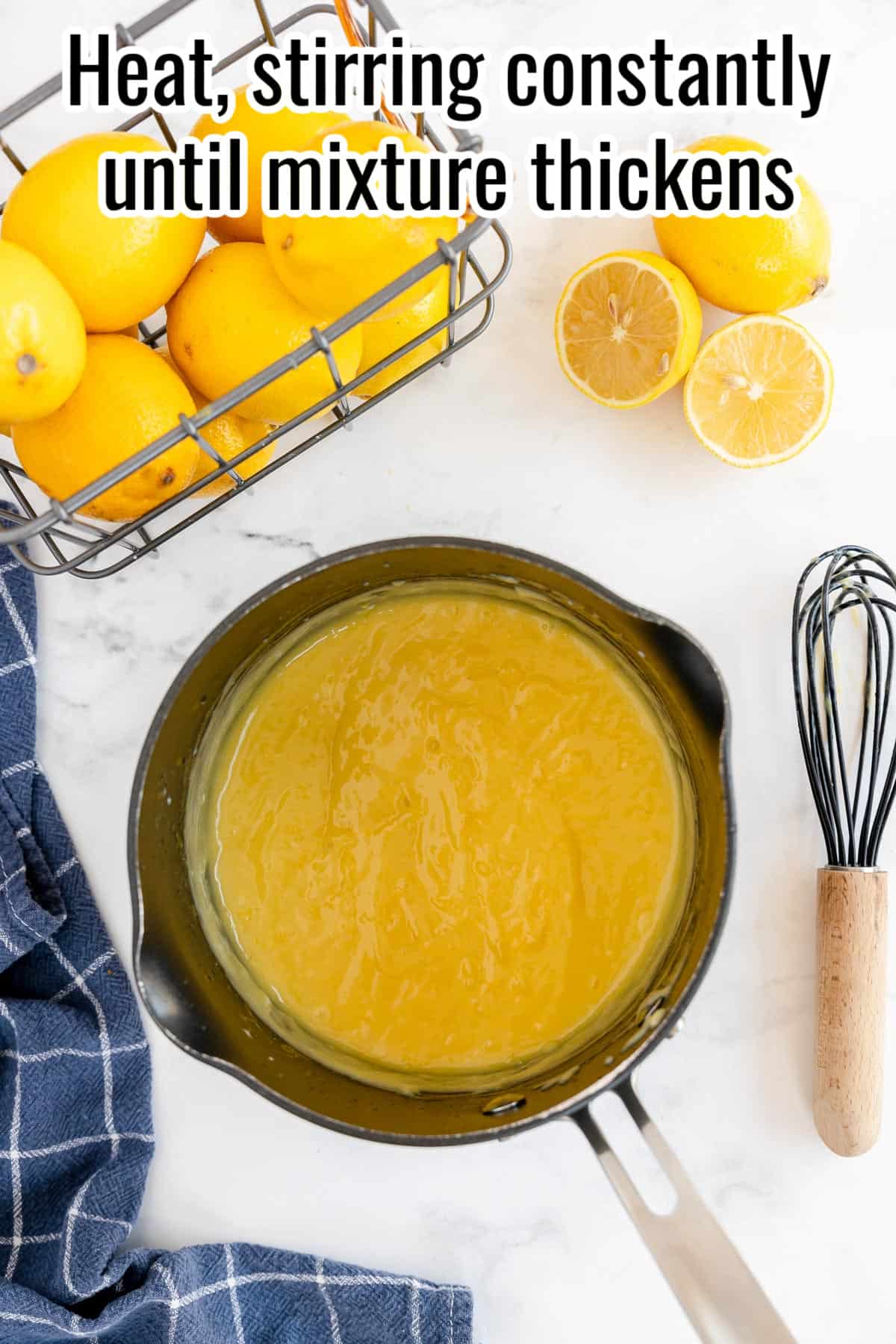 thickened lemon curd in a saucepan.