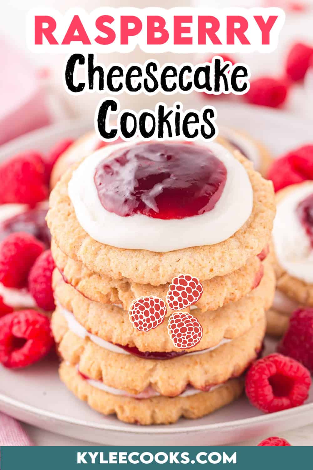 raspberry cheesecake cookies stacked on a plate with raspberries.