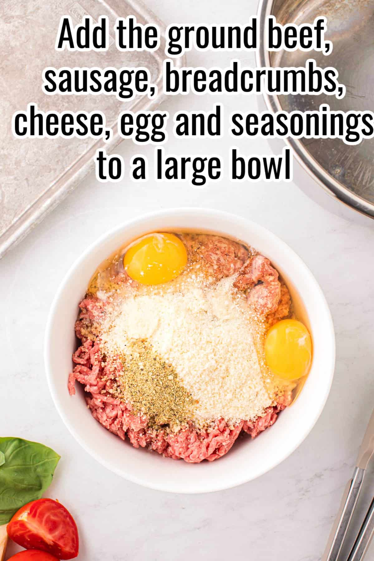 a white bowl with meatball ingredients in it.