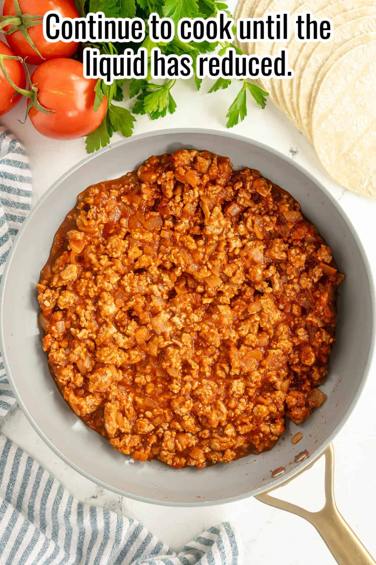 a skillet with ground turkey taco meat.
