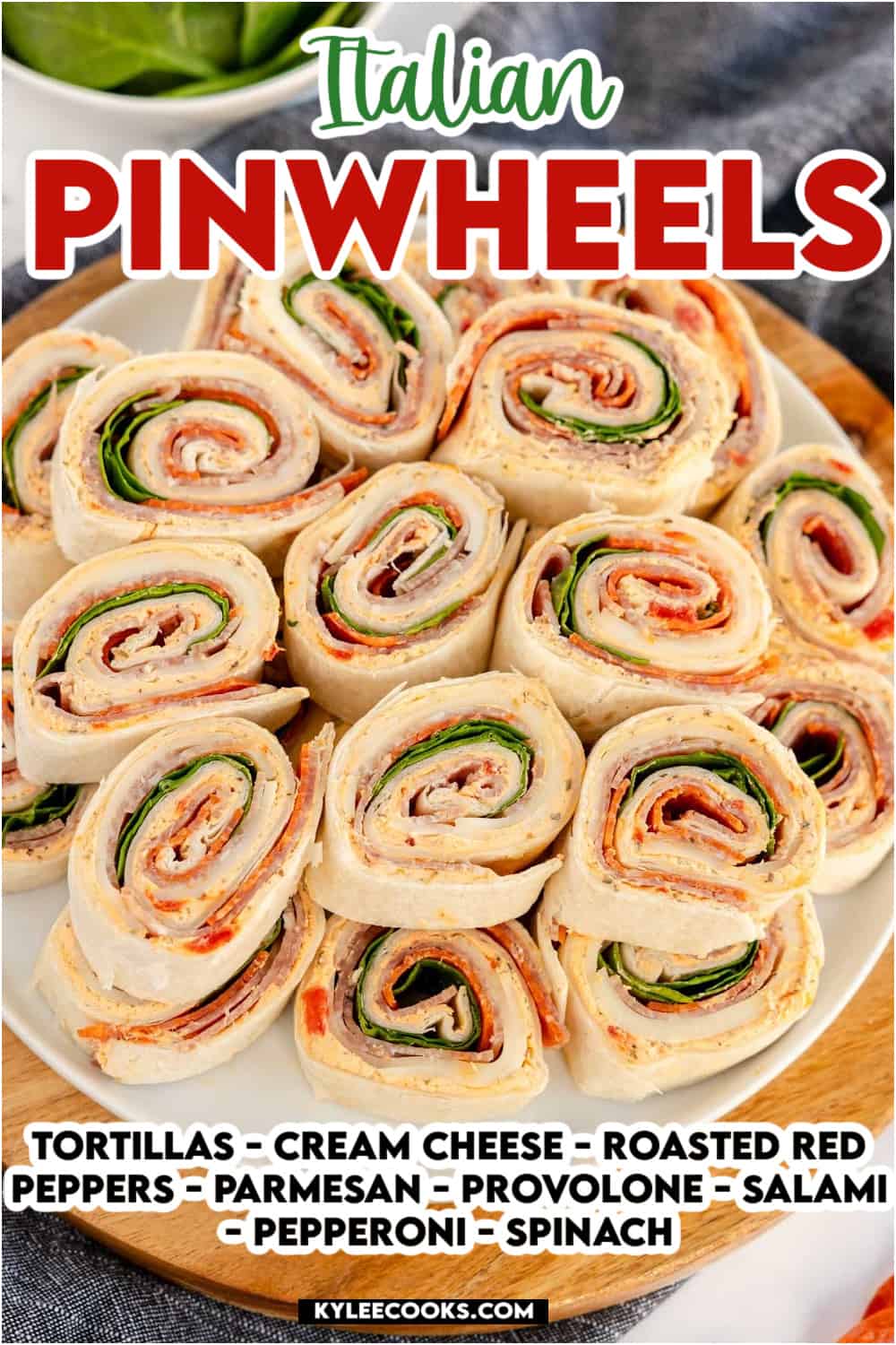 sliced italian pinwheels on a platter with recipe name and ingredients overlaid in text.