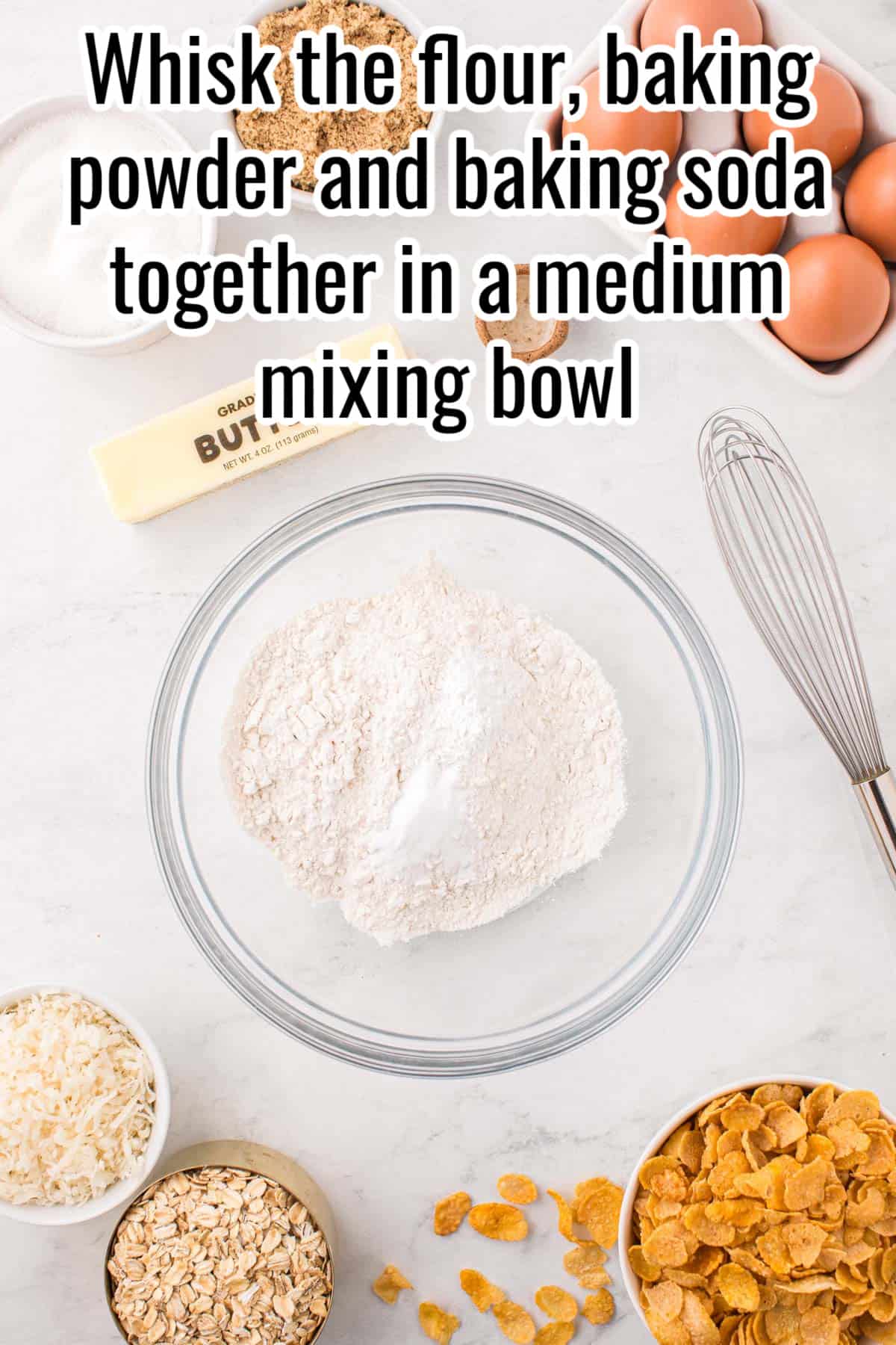 glass bowl with flour, baking soda and baking powder.