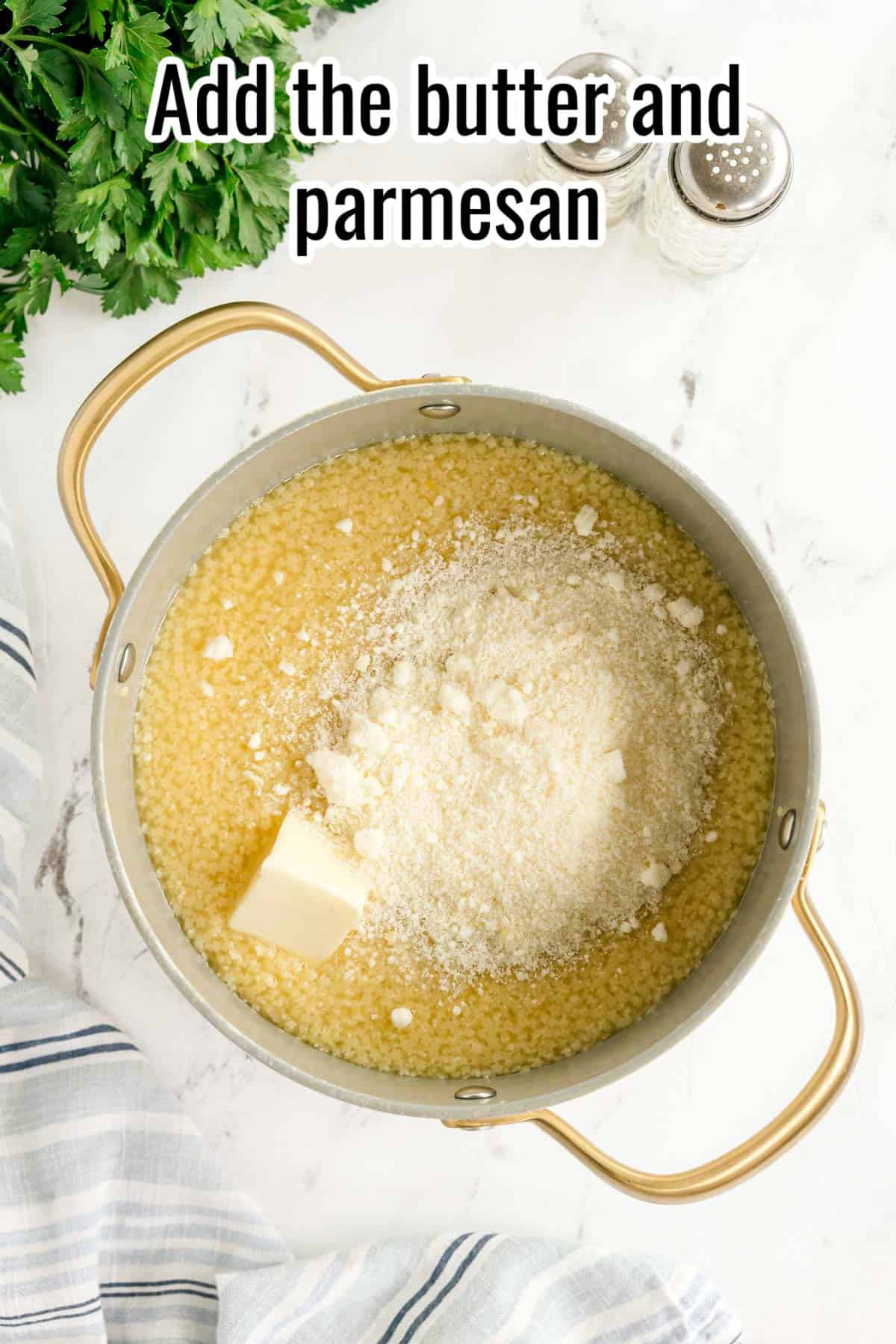 Butter and parmesan added to a pot of cooked pastina. Text on the image says 'Add the butter and parmesan'.