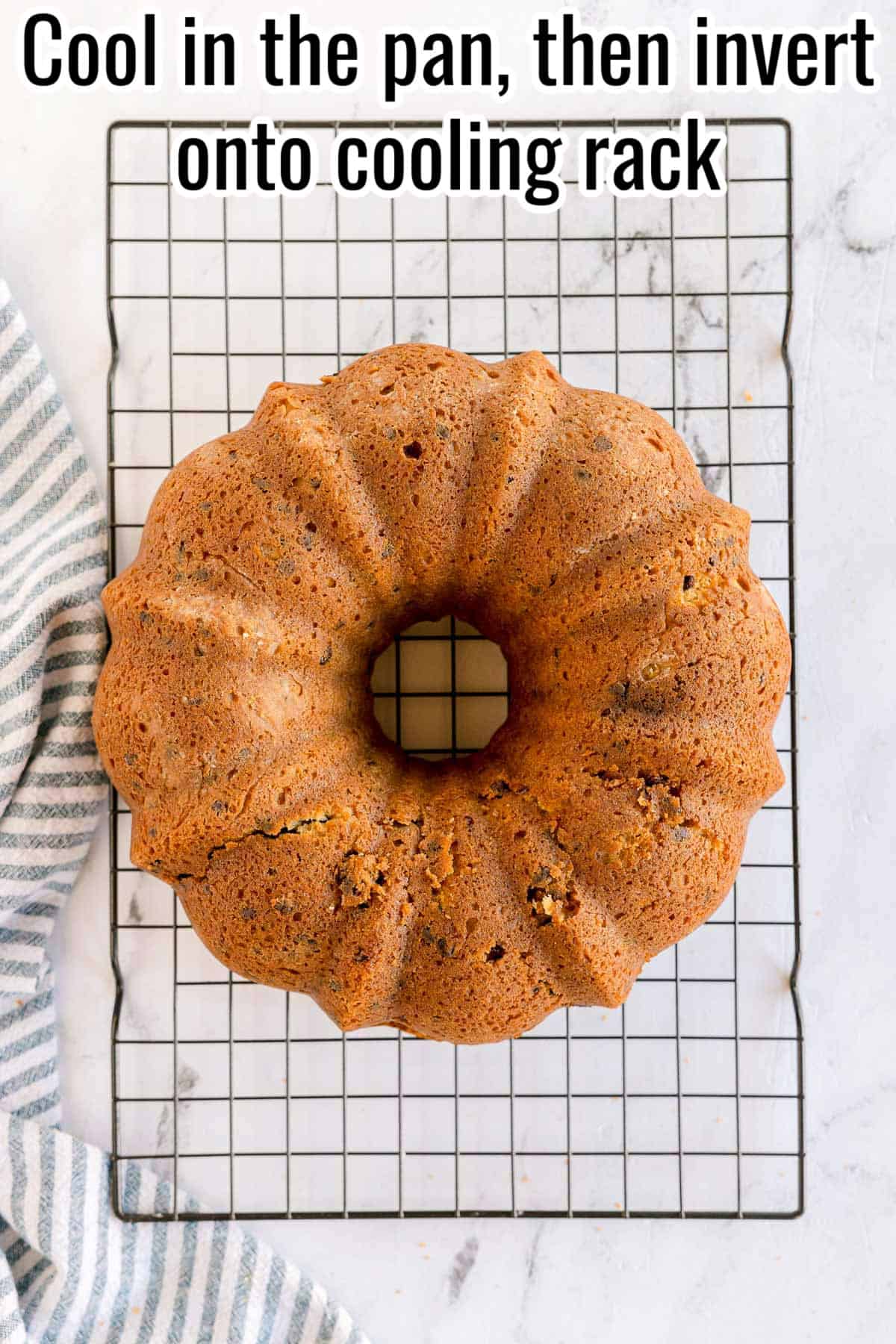 Bundt cake turned out onto a wire rack. Text on the image says 'Cool in the pan, then invert onto cooling rack'.