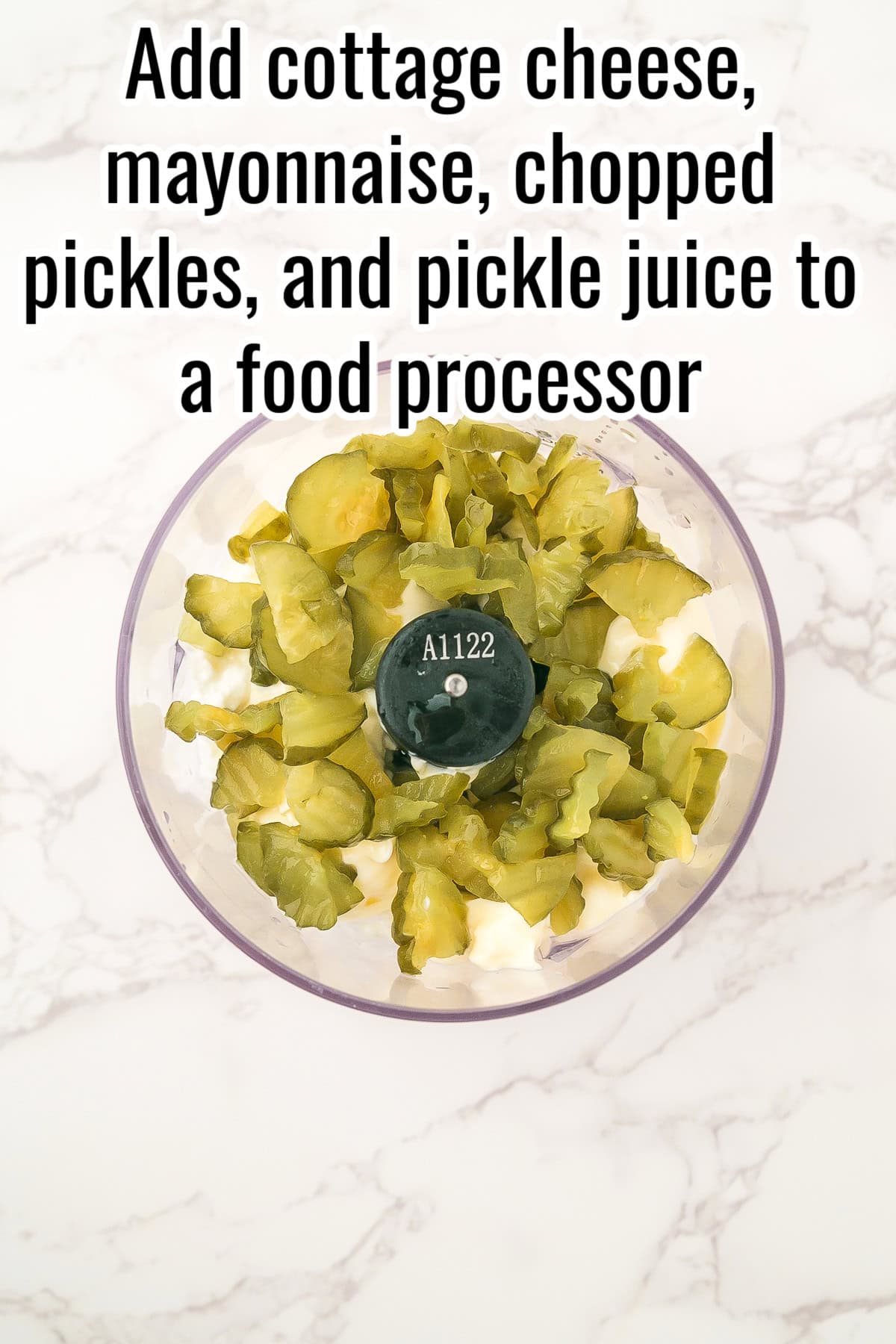 Chopped pickles, mayonnaise, cottage cheese, and pickle juice in a food processor. Text on the image says 'Add cottage cheese, mayonnaise, chopped pickles, and pickle juice to a food processor'.