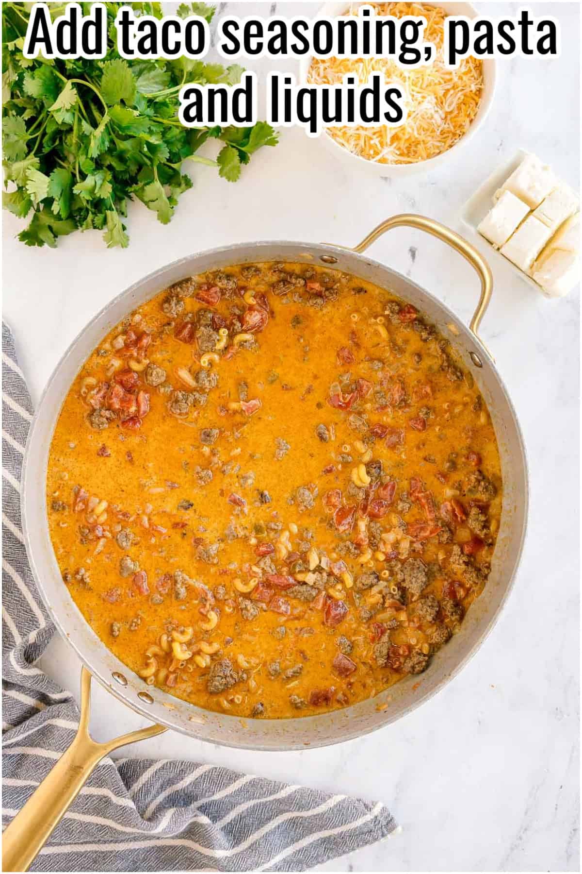 A skillet with taco-seasoned beef, pasta, and liquids. Text on the image says 'Add taco seasoning, pasta and liquids'.