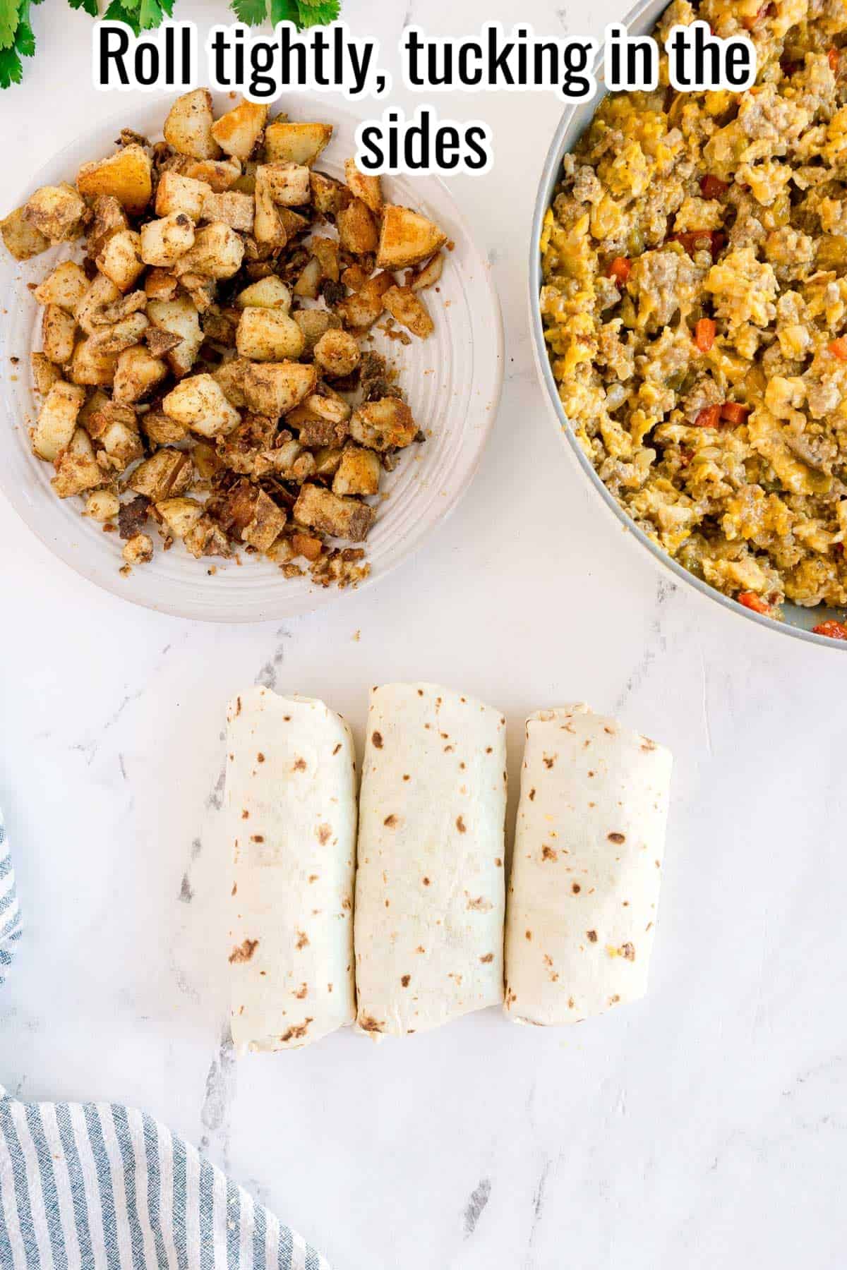 Three burritos rolled tightly on a surface with text overlay “Roll tightly, tucking in the sides.”