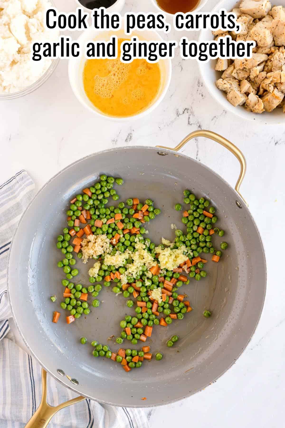 Peas, carrots, garlic, and ginger cooking in a skillet. Text on the image says 'Cook the peas, carrots, garlic and ginger together'.