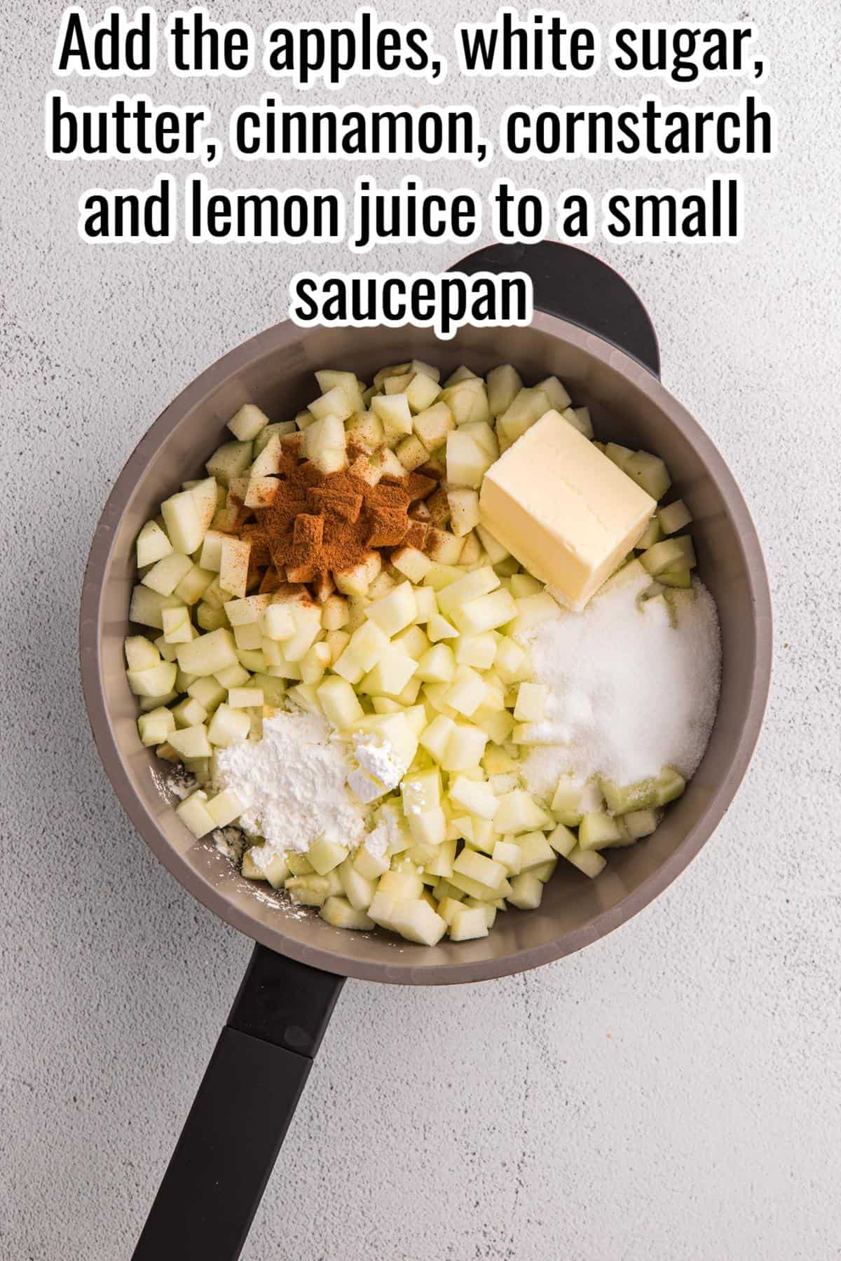 Chopped apples, white sugar, butter, cinnamon, cornstarch, and lemon juice are in a small saucepan, ready to be mixed and cooked.